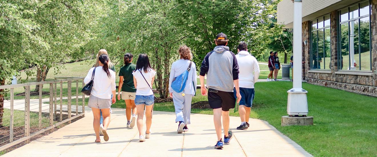 students walking on campus